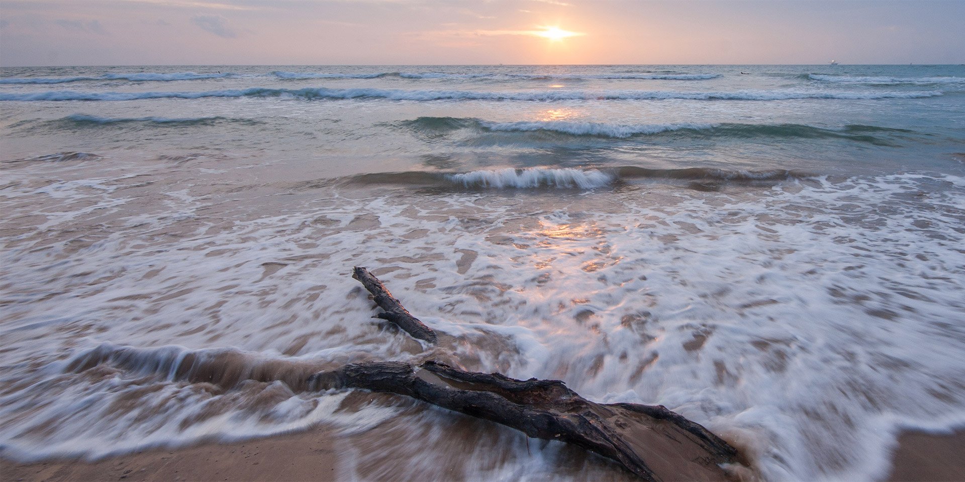 ocean scene with sunset as page background