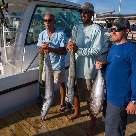 weighmaster at a fishing tournament