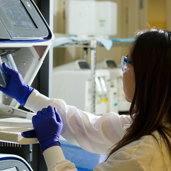 A researcher running tests