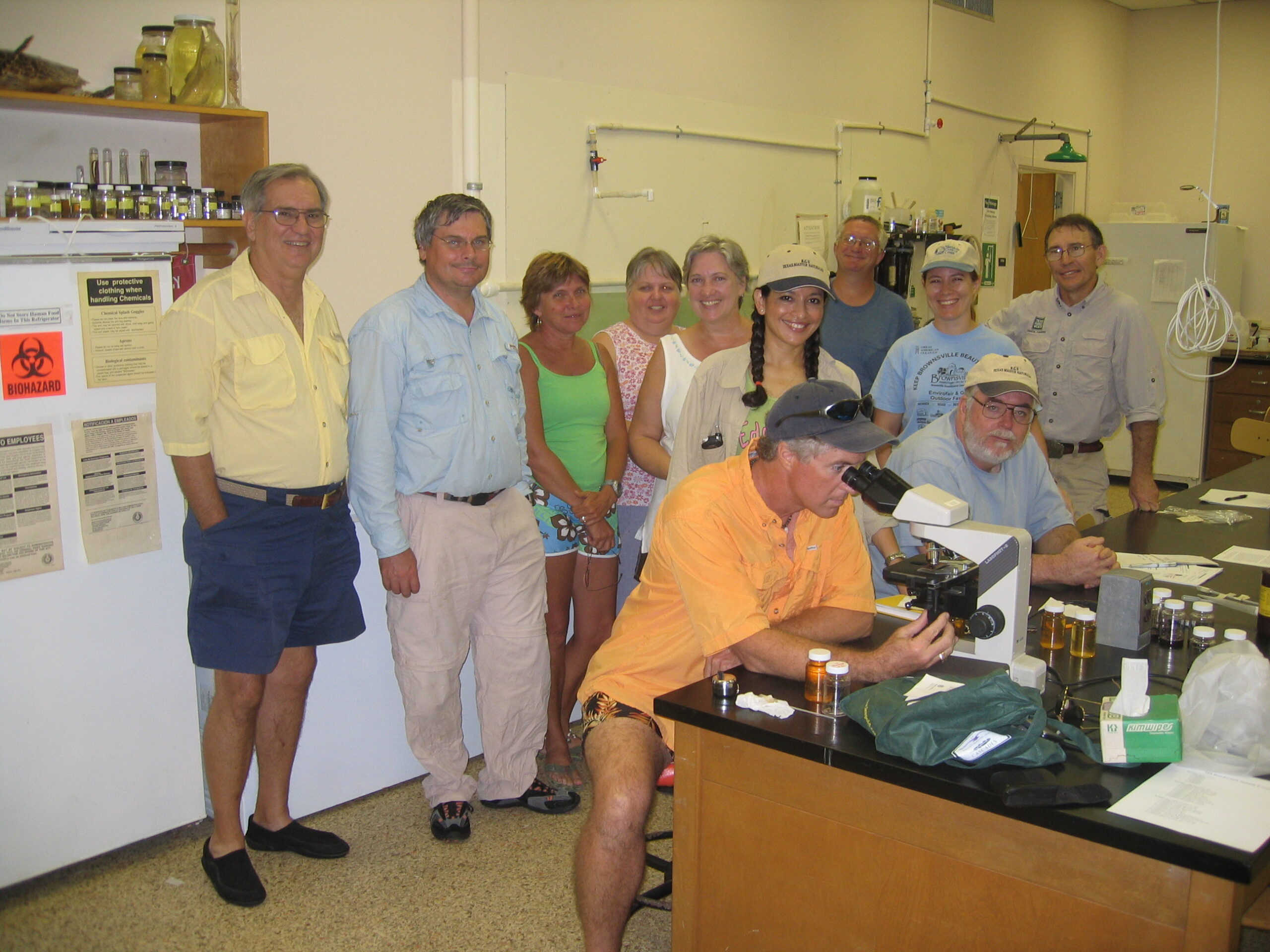 Red tide rangers observing minerals in water