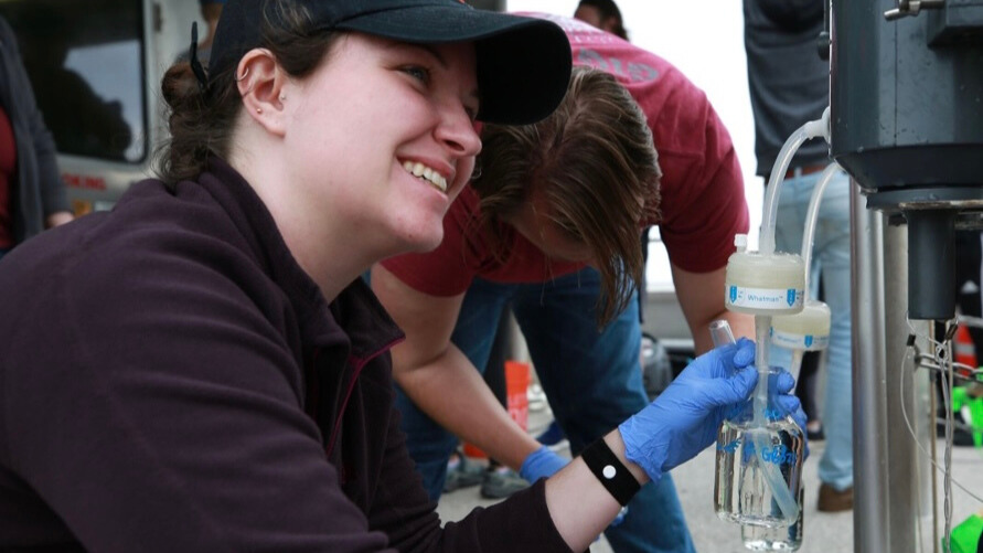 Dr. Hicks taking samples during her research.
