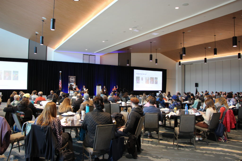 Attendees viewing a presentation at the 2025 Local Seafood Summit