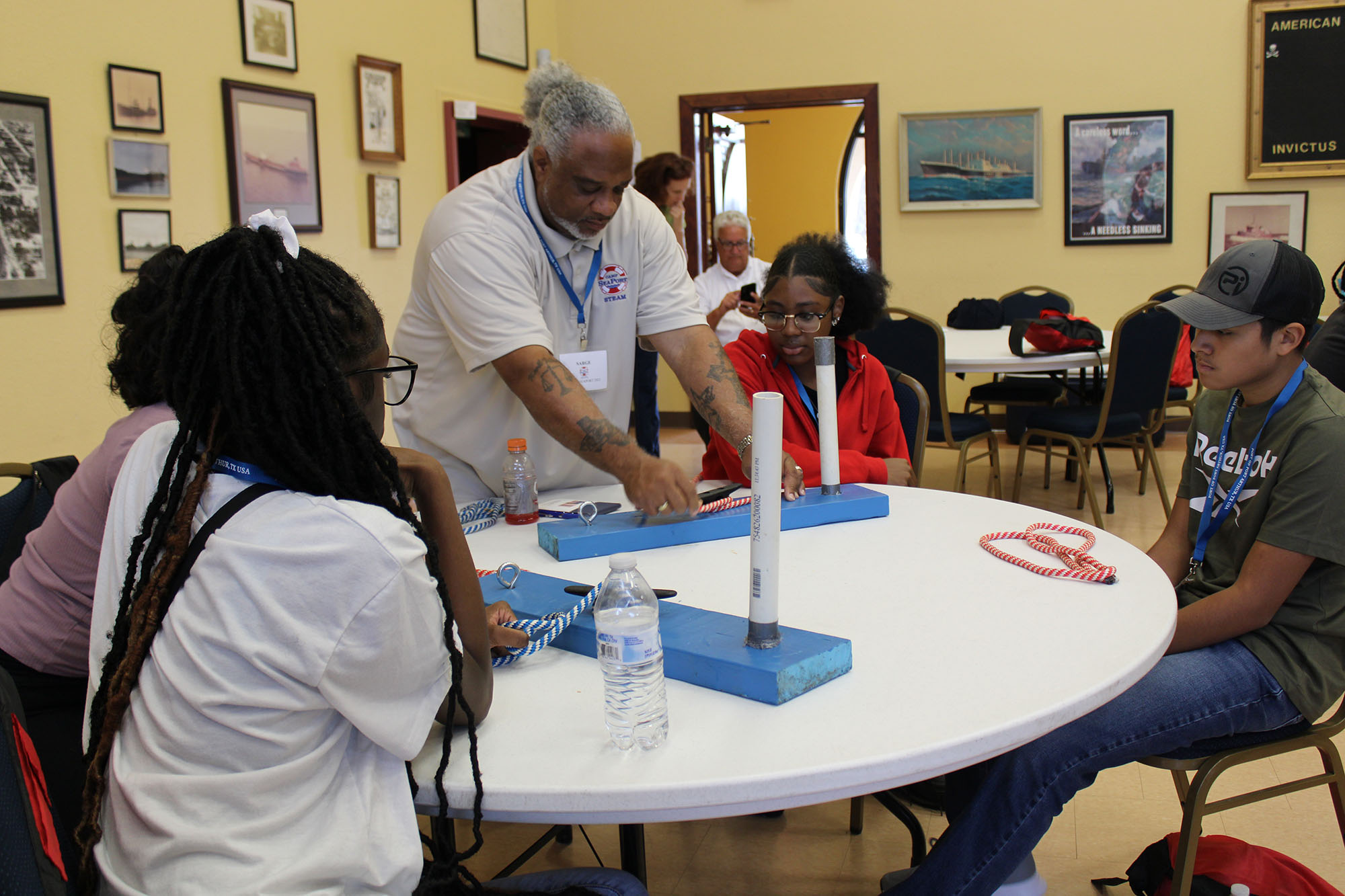 Man showing how to tie nautical knots
