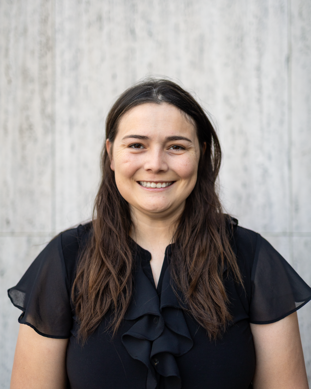 Headshot of Madgellen Cleary