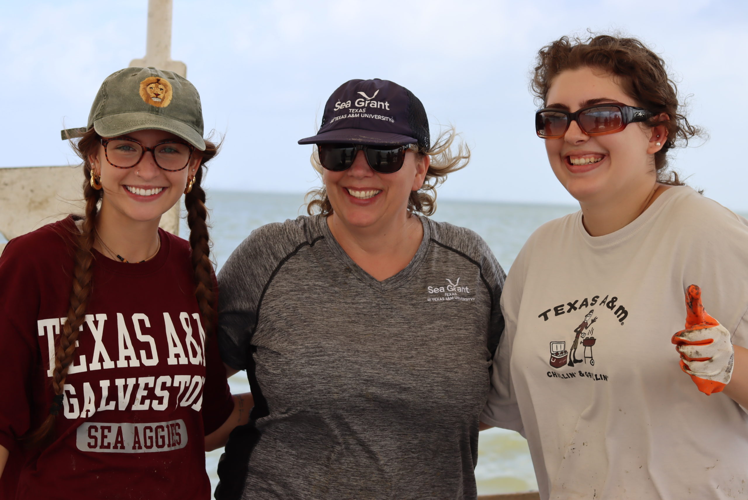 Sadie, Hailey and Brandi aboard a research vessel at Rett Reef
